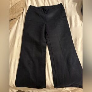 Navy blue bell bottom pants Lacoste size 4 gently used